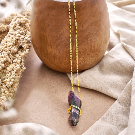 Natural amethyst crystal necklace ideal for stress relief, balance, and soothing energy