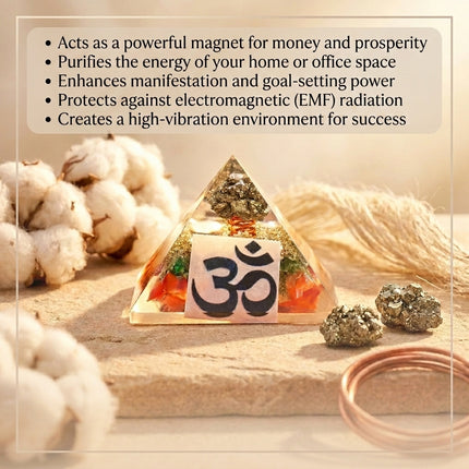 Orgone Pyramid featuring natural Pyrite and a sacred Om symbol, designed for wealth attraction, EMF protection, and home energy purification