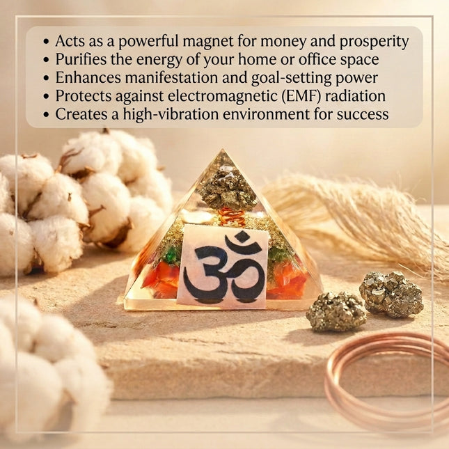 Orgone Pyramid featuring natural Pyrite and a sacred Om symbol, designed for wealth attraction, EMF protection, and home energy purification