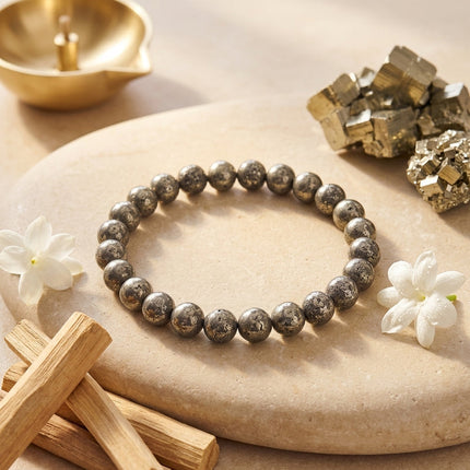 A rough stone pyrite bracelet showcasing the natural metallic luster of the mineral for manifestation and abundance.