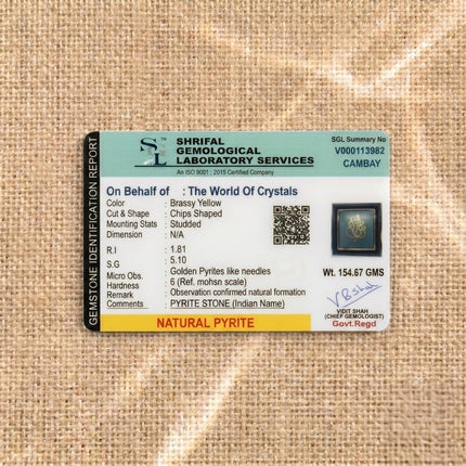 Shrifal Gemological Laboratory report for a Ganesha Natural Pyrite Dust frame by The World Of Crystals, confirming natural pyrite chips and a total weight of 154.67 GMS