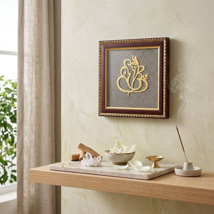 Elegant wooden frame of Lord Ganesha textured with pyrite crystals to attract success in a professional office.