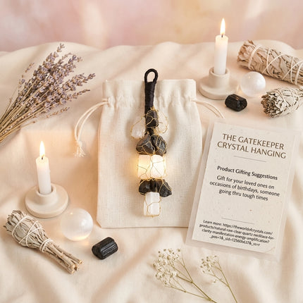 The Gatekeeper protection crystal hanging displayed on a white drawstring pouch with a gifting card, perfect for birthdays or supporting loved ones through tough times