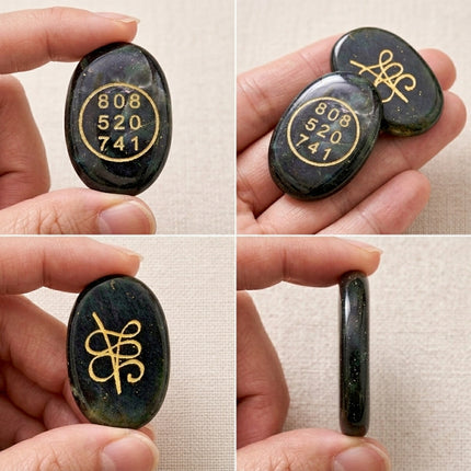 A four-way collage showing close-up details of the Grabovoi 808 520 741 code and Zibu symbol engraved on oval green crystal coins, including a side profile