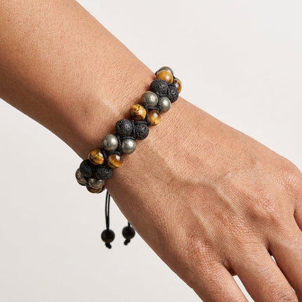 Natural hematite, black obsidian, and tiger eye beads blended in a bracelet to block negative energy.