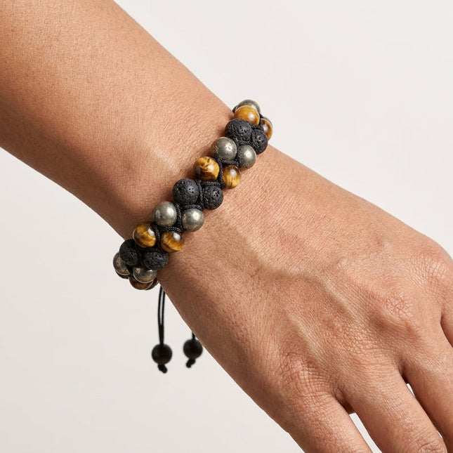 Natural hematite, black obsidian, and tiger eye beads blended in a bracelet to block negative energy.