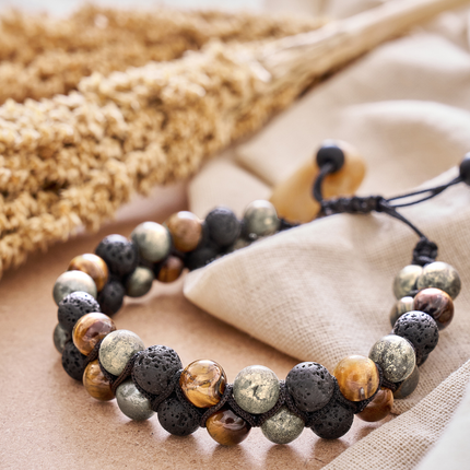 Triple protection healing stone bracelet used for grounding and focus during meditation or yoga practice.