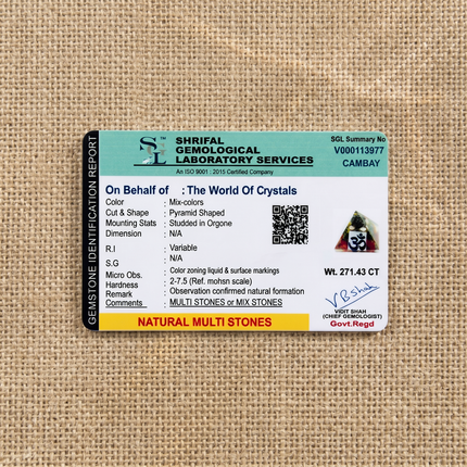 Gemstone identification report from Shrifal Gemological Laboratory for a Natural Multi Stones OM Pyramid studded in orgone by The World Of Crystals, confirming natural formation and a weight of 271.43 CT