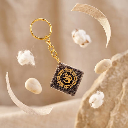 Detailed view of the high-quality pyrite stone texture on this OM engraved healing crystal keychain.