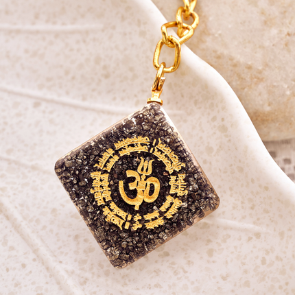 Raw metallic pyrite crystal keychain used for grounding energy and boosting personal willpower.