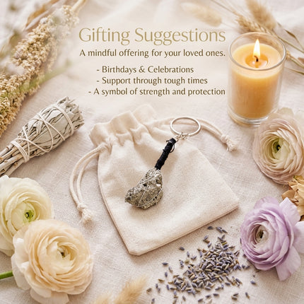 Raw Peruvian Pyrite keychain presented on a white drawstring pouch with a gift card, ideal for manifesting abundance and professional success.