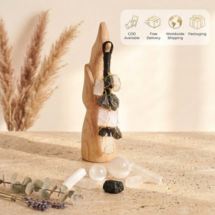 Product overview of the Black Tourmaline and Selenite raw crystal hanging with icons for Cash on Delivery (COD), Free Delivery, Worldwide Shipping, and Secure Packaging