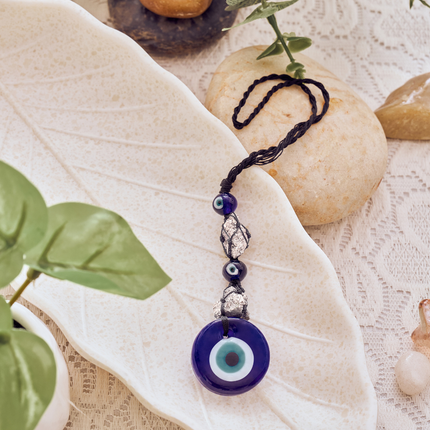 Raw pyrite keychain with evil eye charm for protection, abundance, and shielding negative energy