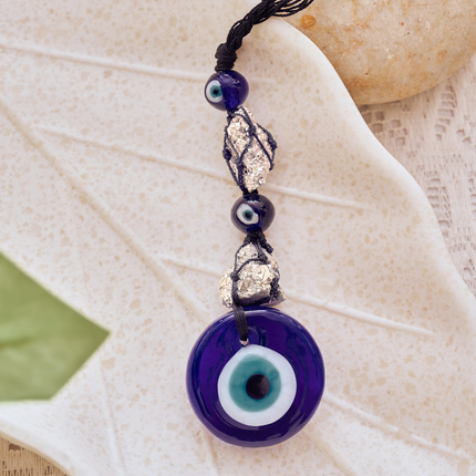 Pyrite evil eye keychain ideal as a gift for wealth attraction, protection, and spiritual growth