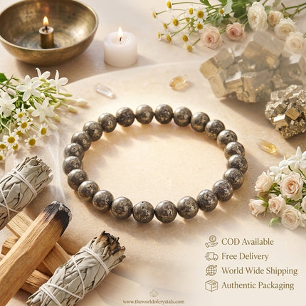 Service overview for the Raw Pyrite bracelet from The World of Crystals with icons for Cash on Delivery, Free Shipping, and Worldwide Delivery