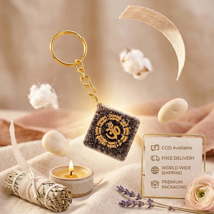 Service overview for the Pyrite OM keychain from The World of Crystals featuring Cash on Delivery, Free Nationwide Shipping, and Secure Packaging.